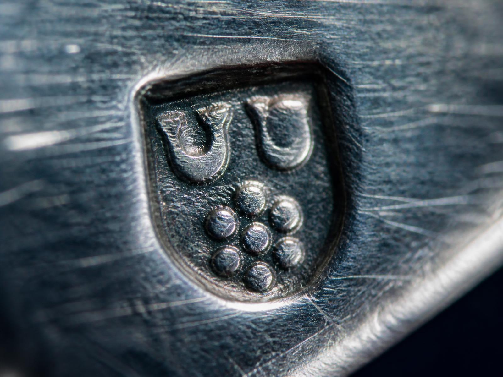 Hallmark stamped into the inner face of a silver piece